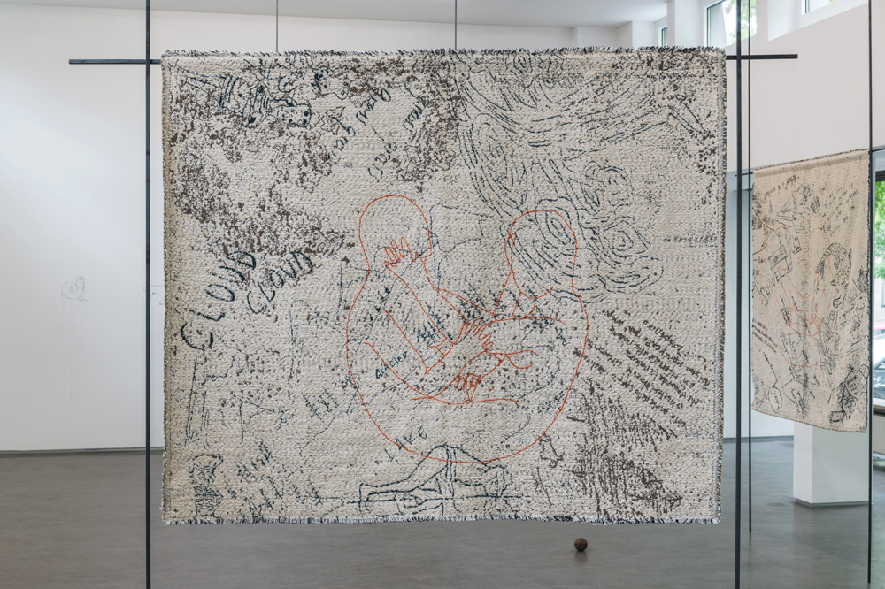 Exhibition view BEYOND THE GARDEN, Claudia Losi; Galerie Stadtpark Krems, 2026; Photo: Stefan Lux; Claudia Losi; Like a Forest Garden (cloud cloud), 2022–26; Cotton jacquard fabric, wool embroidery, 118 x 144 cm