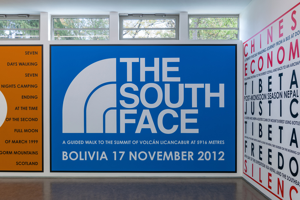 Exhibition view; NATURE AS COMMUNITIES; NOT COMMODITIES, Hamish Fulton,; Gallery Stadtpark Krems, 2026; Photo: Stefan Lux; The South Face. Bolivia 2012.; Wall painting, vinyl lettering, variable size; Courtesy and © Hamish Fulton